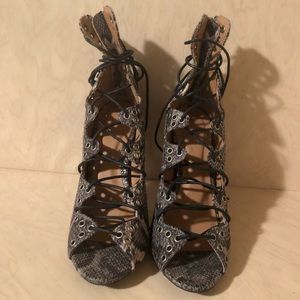 Strappy snakeskin heel